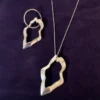 grafitti pendants in gold