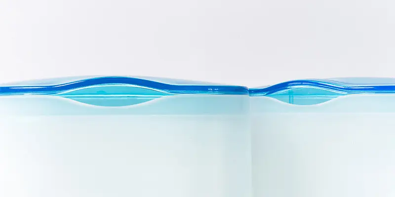 Minimalist bathroom accessories for Hema with translucent blue product detail