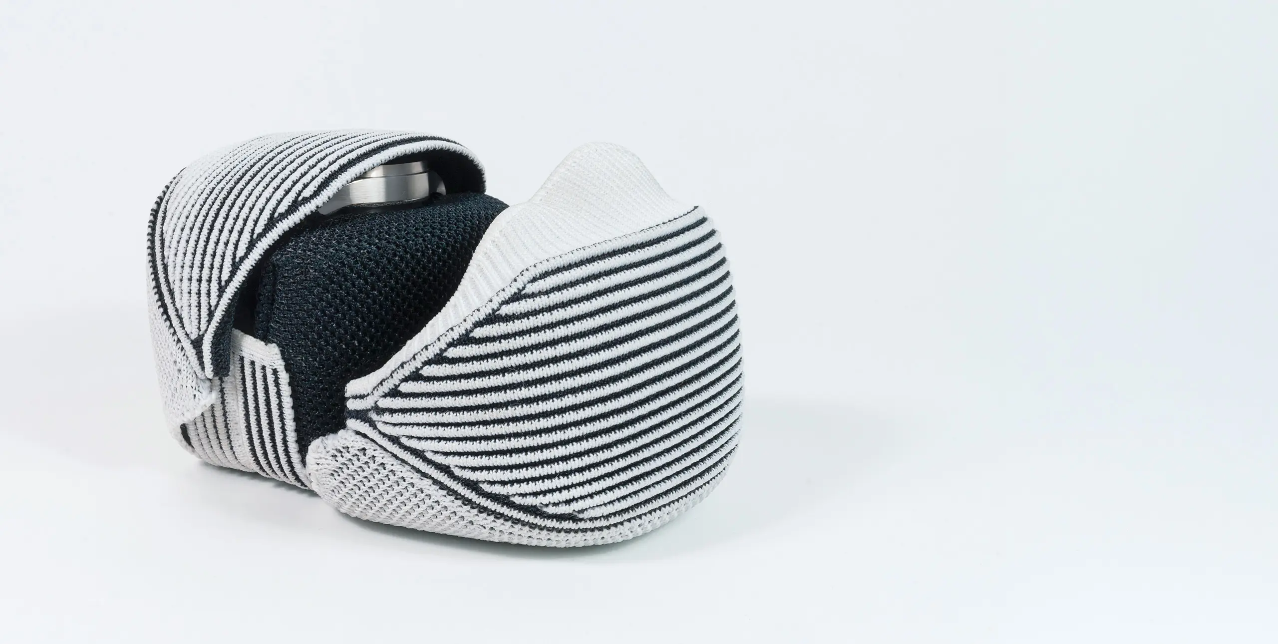 3D knitted luxury watch pouch with protective soft goods construction