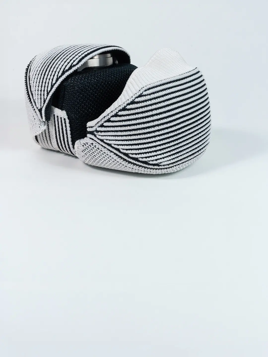 Close-up of 3D knitted watch pouch for sustainable luxury packaging